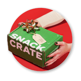 a green Holiday crate with a gold bow being handed to you on a red background