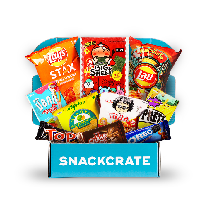 A blue open SnackCrate from Thailand overflowing with snacks