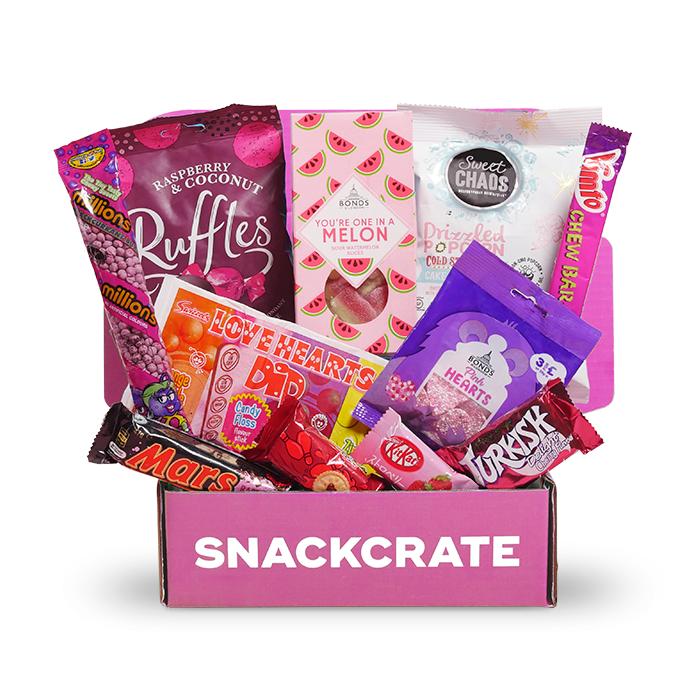 Image of an open Valentine’s collection box overflowing with snacks