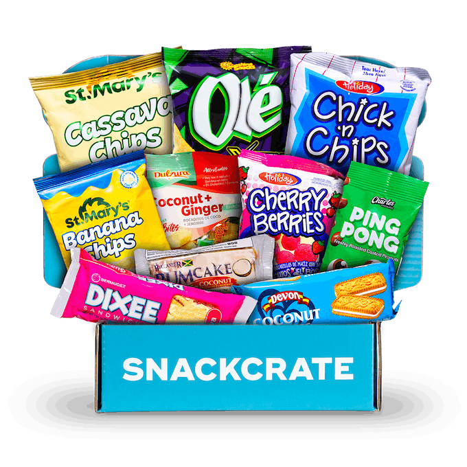 A blue open SnackCrate from Caribbean overflowing with snacks