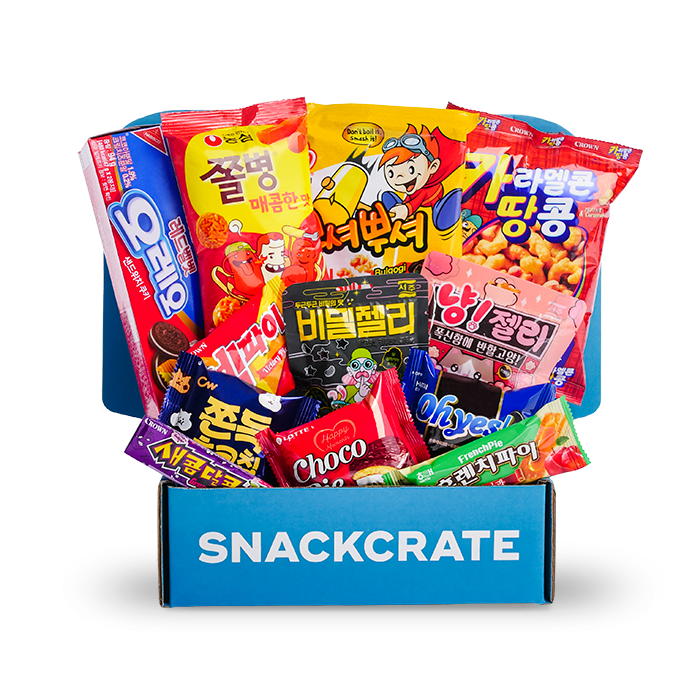 A blue open SnackCrate from South Korea overflowing with snacks