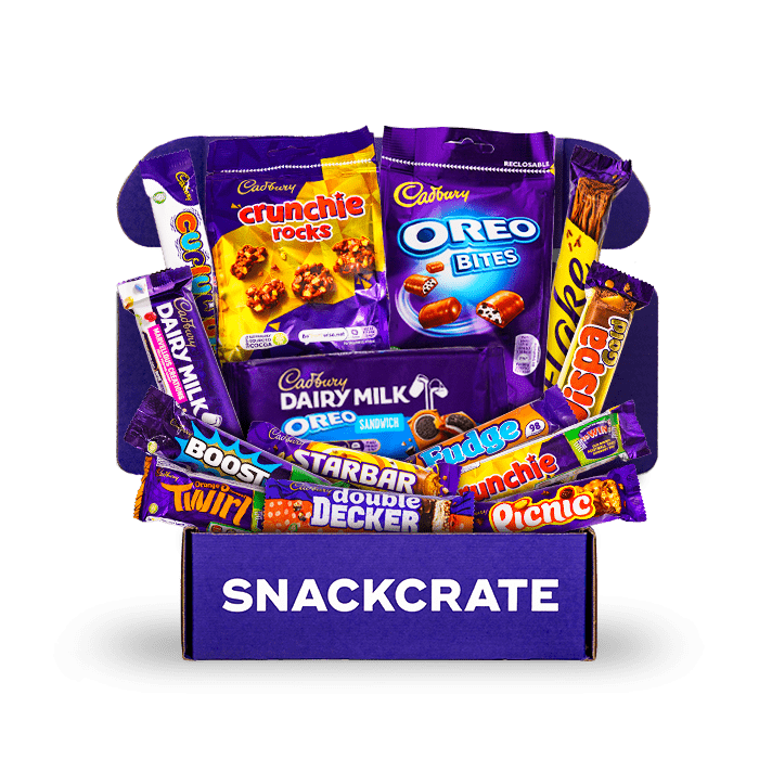 Image of an open Ultimate Cadbury collection box overflowing with snacks