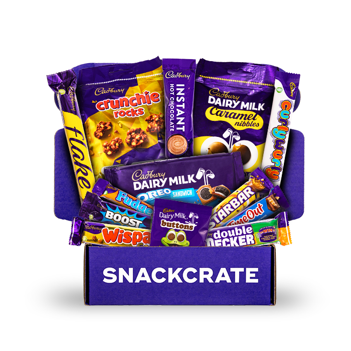 Image of an open Cadbury collection box overflowing with snacks