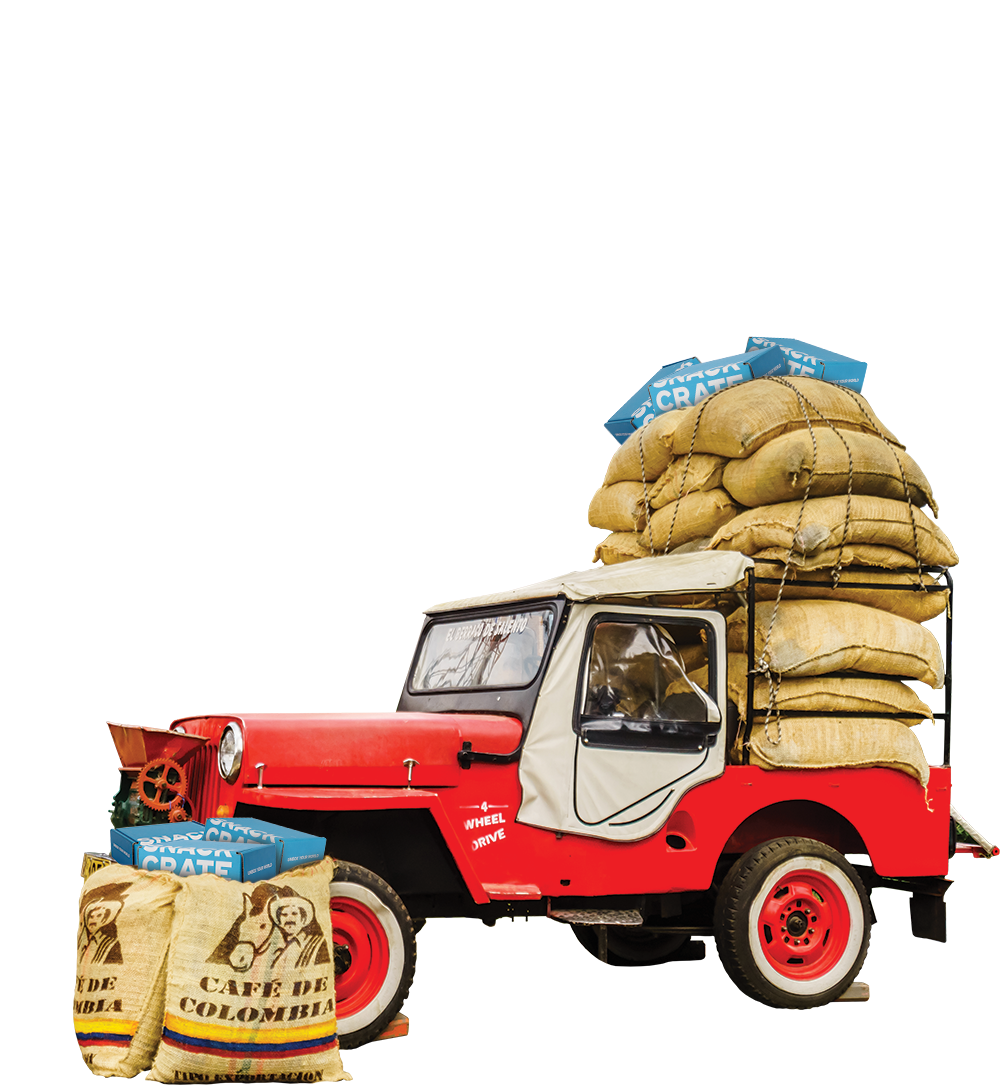 A red jeep carrying sacks of Colombian coffee beans and blue SnackCrates.