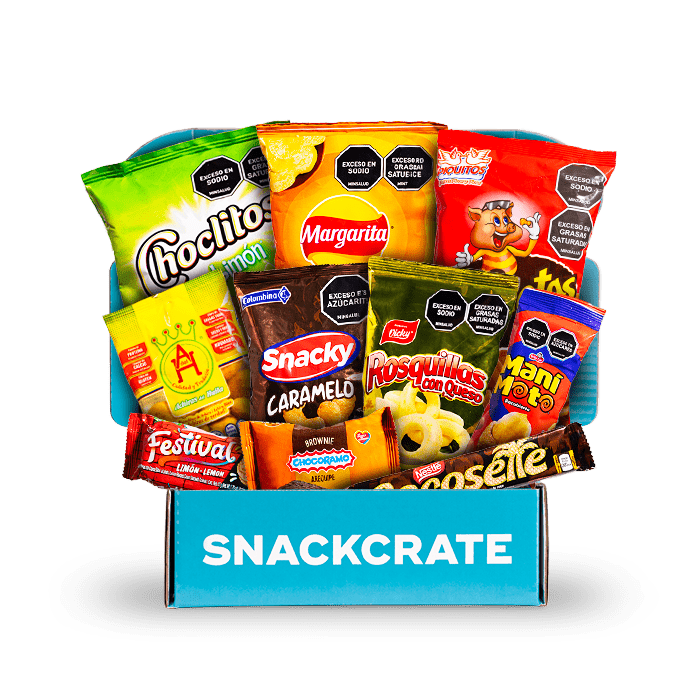 A blue open SnackCrate from Colombia overflowing with snacks