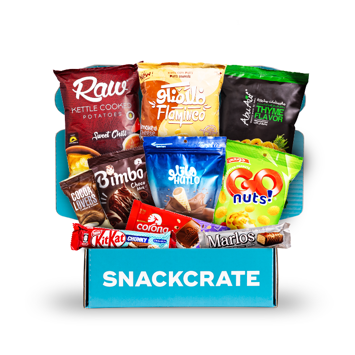A blue open SnackCrate from Egypt overflowing with snacks