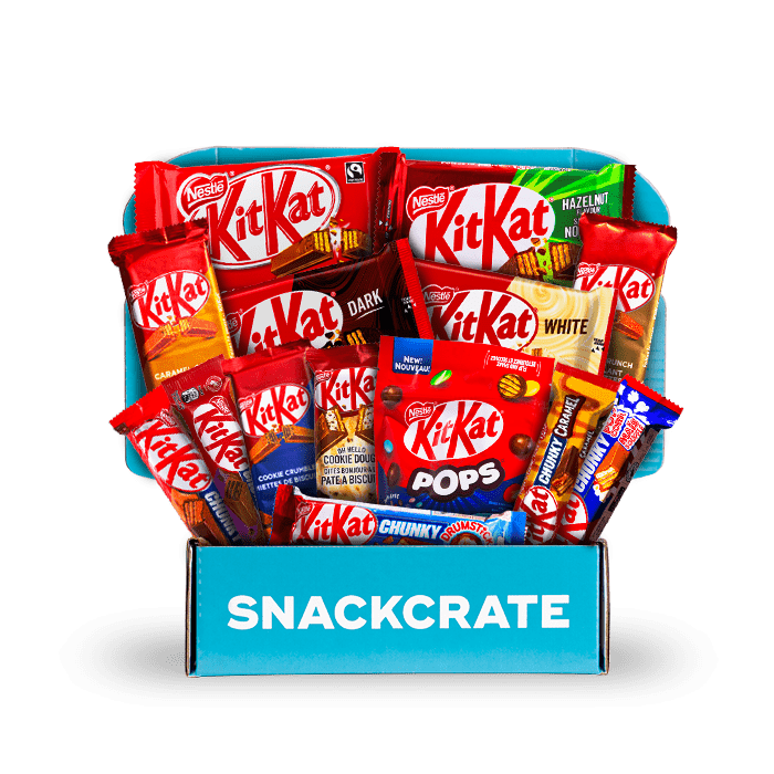 Image of an open Ultimate Kit Kat collection box overflowing with snacks